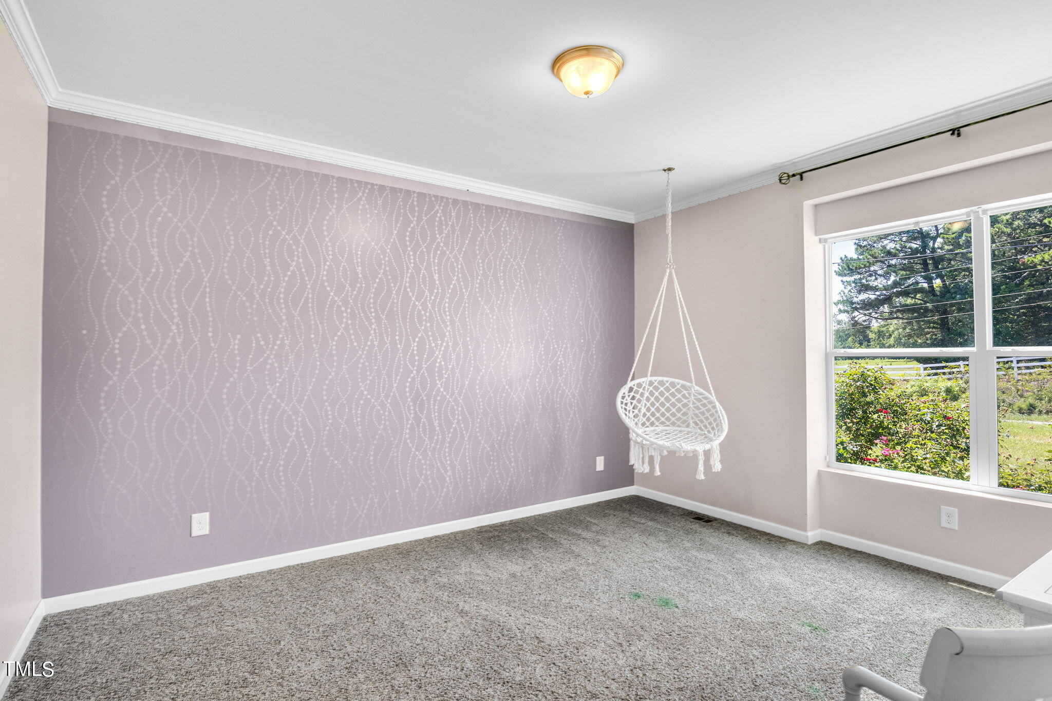3218 Old N C 75 Stem, NC 27581 - Photo 10 of 35 a view of an empty room and window