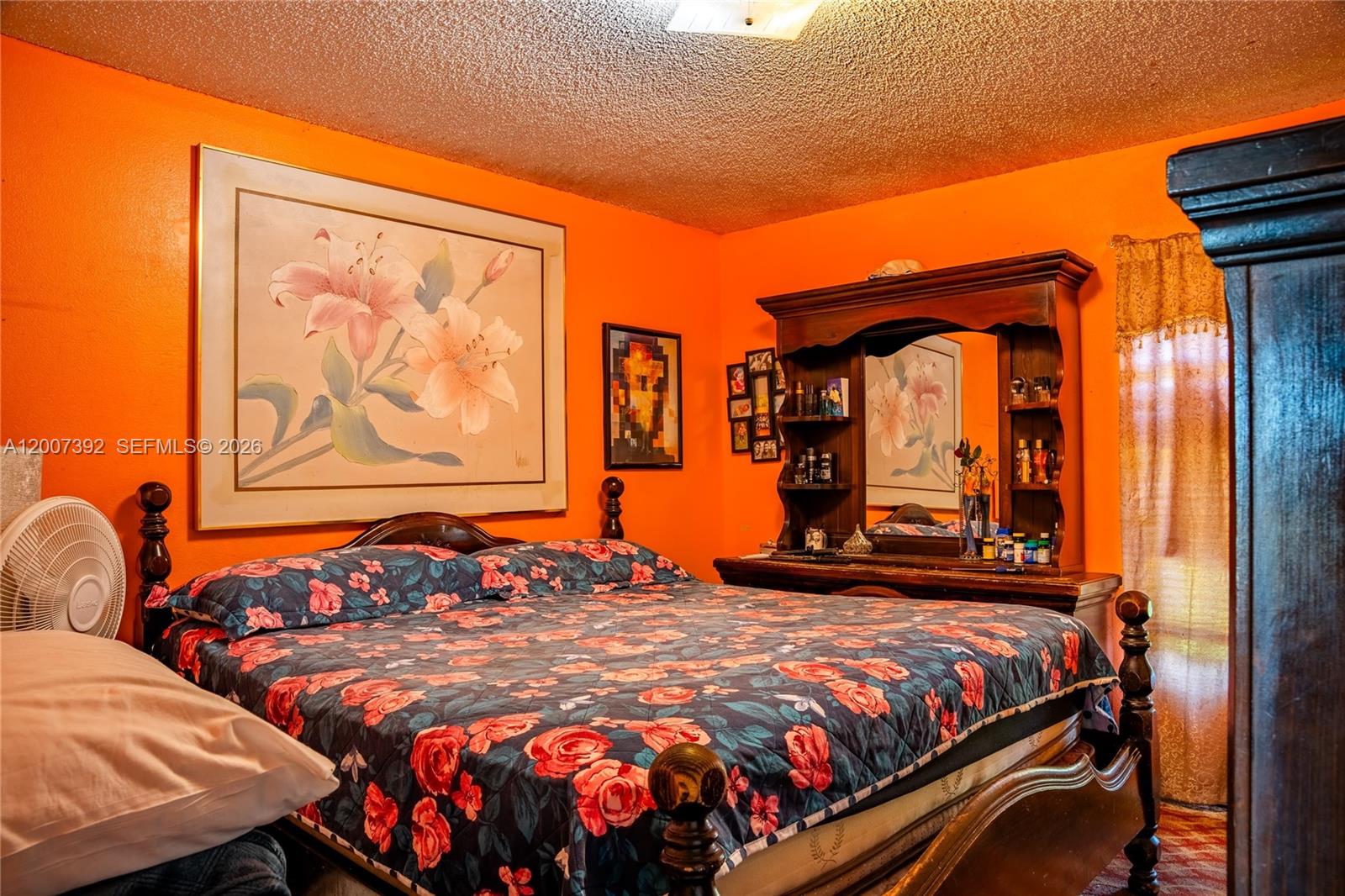 6924 Holly Creek Road Mount Dora, FL 32757 - Photo 7 of 25 a bedroom with bed and window