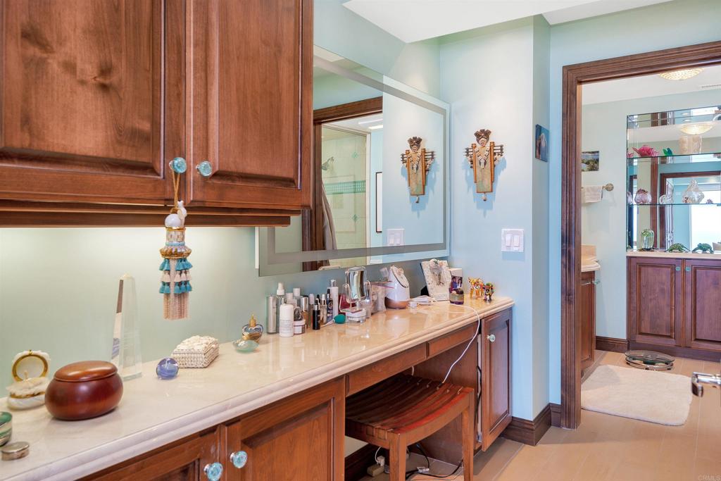 939 Coast Boulevard La Jolla, CA 92037 - Photo 21 of 36 a room with a table chairs and entryway