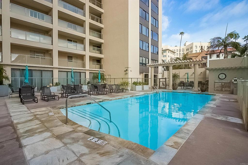 939 Coast Boulevard La Jolla, CA 92037 - Photo 30 of 36 a view of a swimming pool with outdoor seating