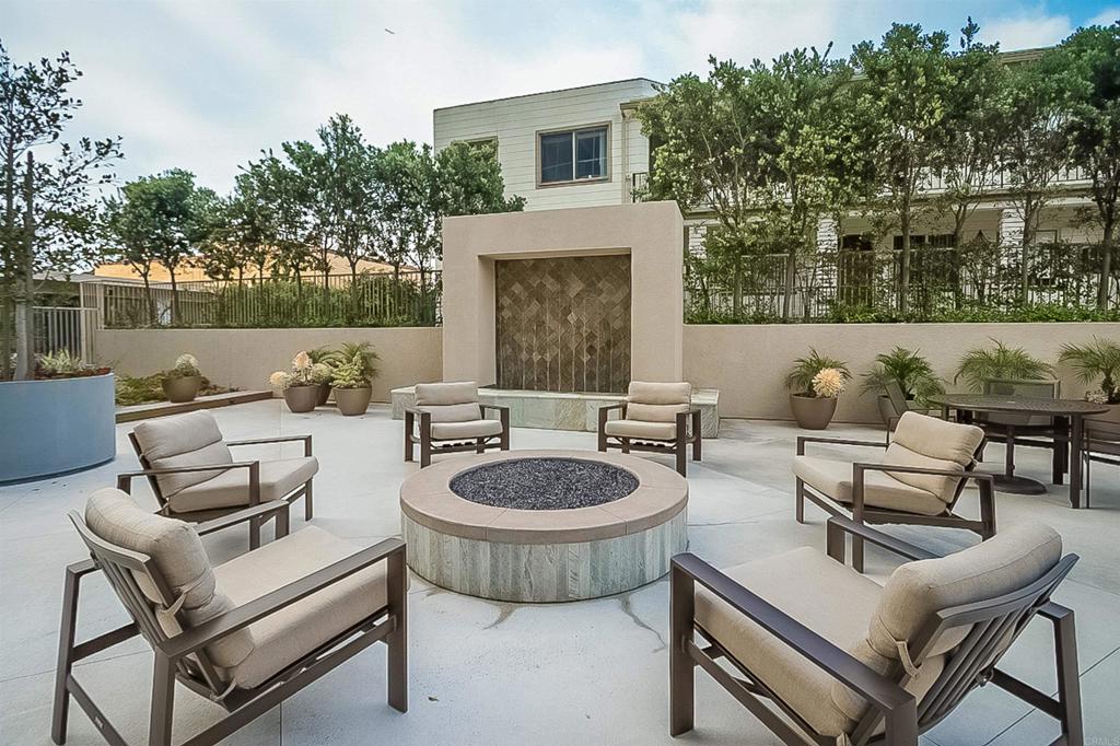 939 Coast Boulevard La Jolla, CA 92037 - Photo 33 of 36 a patio with a couch and chairs