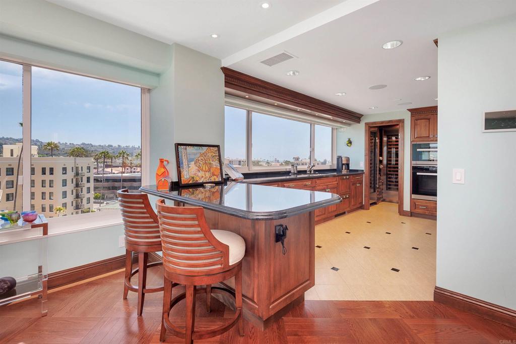 939 Coast Boulevard La Jolla, CA 92037 - Photo 10 of 36 a dining room with furniture and window
