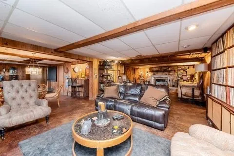 a living room with furniture and a table