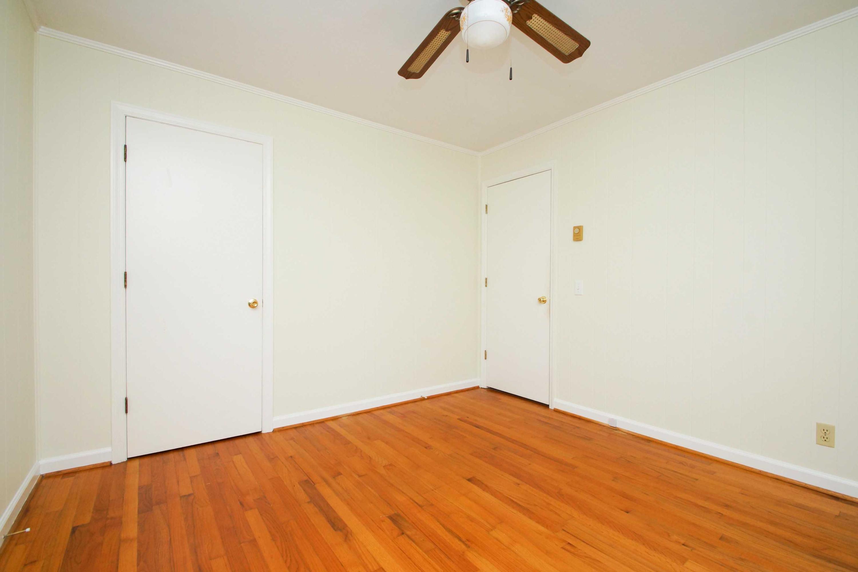 361 Power Dam Road Rocky Mount, VA 24151 - Photo 19 of 25 a view of empty room with wooden floor