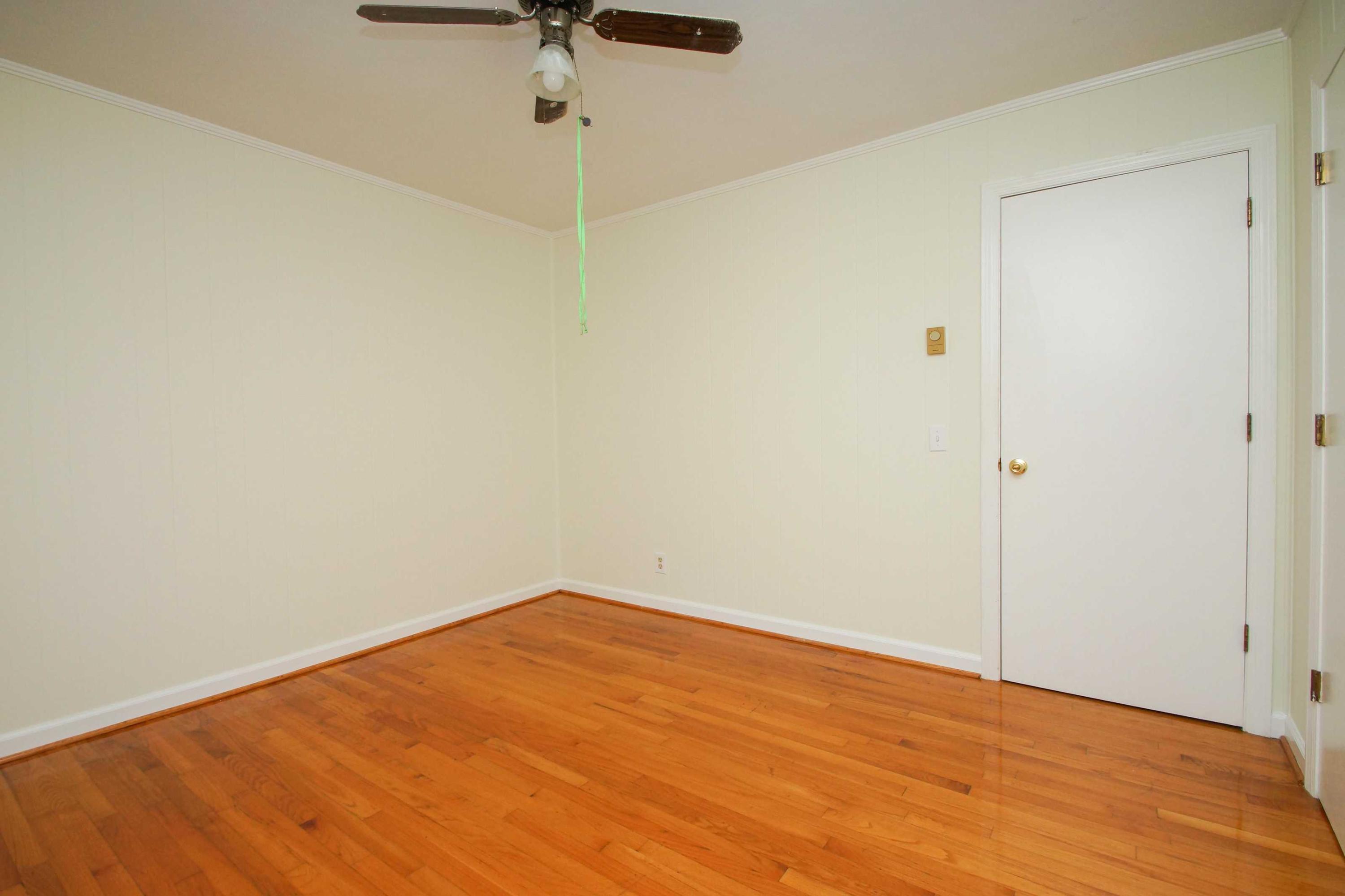 361 Power Dam Road Rocky Mount, VA 24151 - Photo 21 of 25 a view of empty room with wooden floor