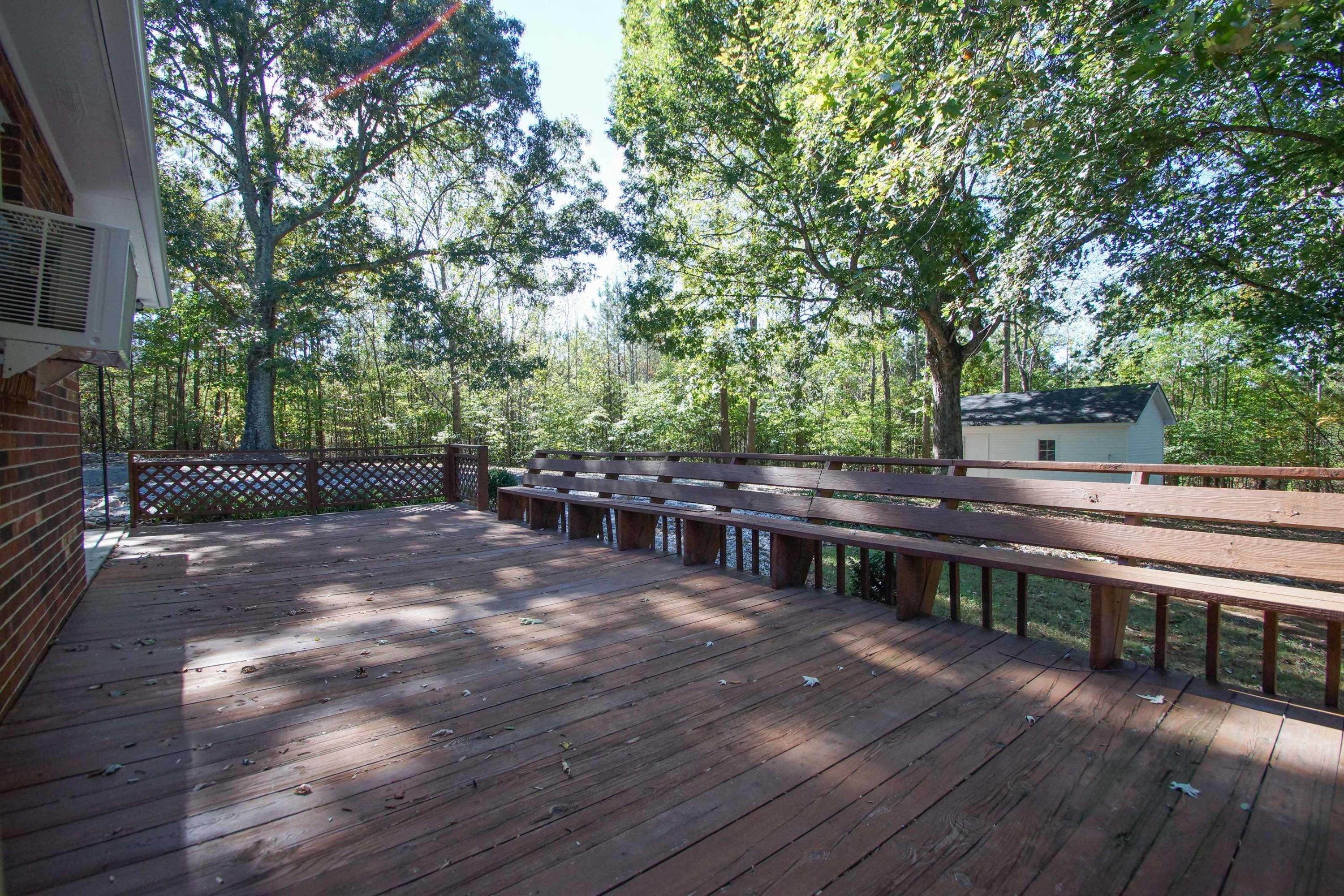 361 Power Dam Road Rocky Mount, VA 24151 - Photo 5 of 25 a view of a house with backyard and sitting area