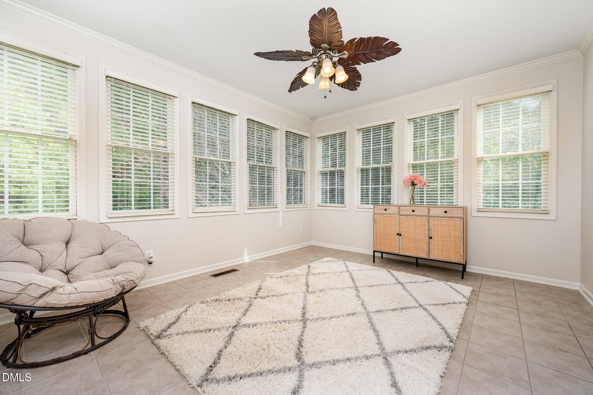 2116 Covered Bridge Court Raleigh, NC 27614 - Photo 18 of 36 a living room with furniture and floor to ceiling windows