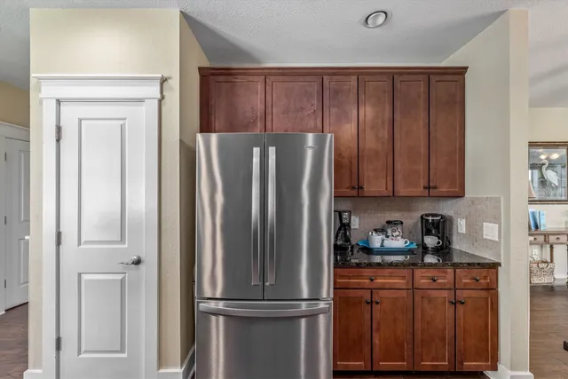 a view of a balcony with chairs