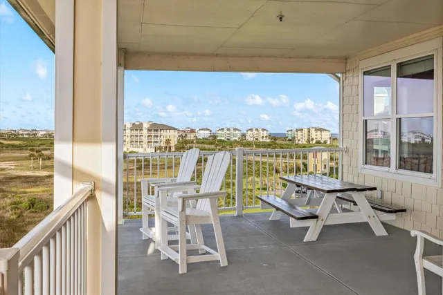a metallic refrigerator freezer sitting in a kitchen