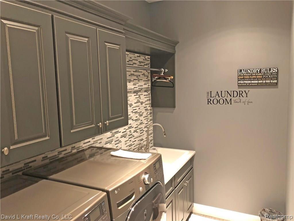 9204 Crescent Beach Road Pigeon, MI 48755 - Photo 57 of 66 9204CrescentBeachLaundryArea2Sink.jpg