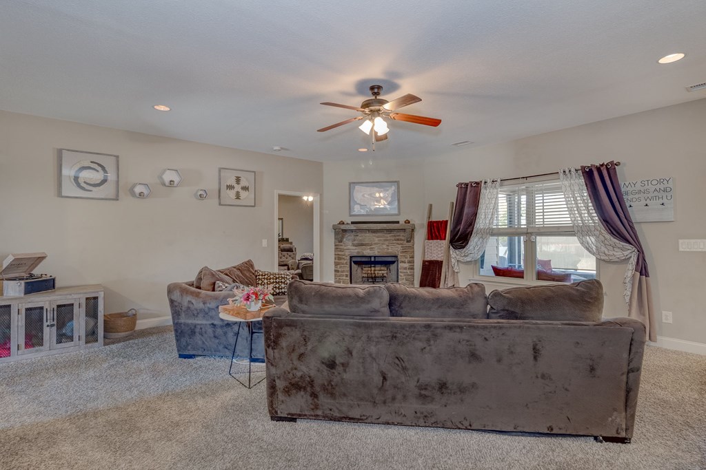 53 Winter Hawk Drive Fort Mitchell, AL 36856 - Photo 11 of 39 a living room with fireplace furniture and a window