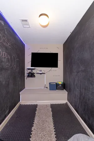 a bathroom with a sink and mirror