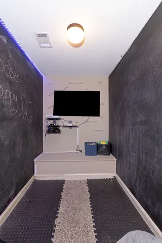 a bathroom with a sink and mirror