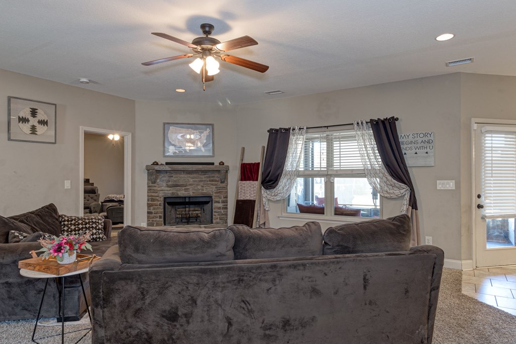 53 Winter Hawk Drive Fort Mitchell, AL 36856 - Photo 3 of 39 a living room with furniture and a fireplace