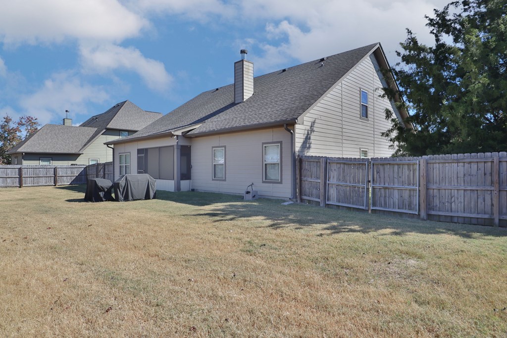 53 Winter Hawk Drive Fort Mitchell, AL 36856 - Photo 38 of 39 a view of a house with a yard and wooden fence