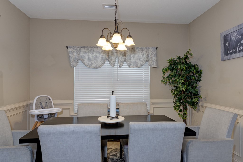 53 Winter Hawk Drive Fort Mitchell, AL 36856 - Photo 4 of 39 a dining room with furniture and chandelier