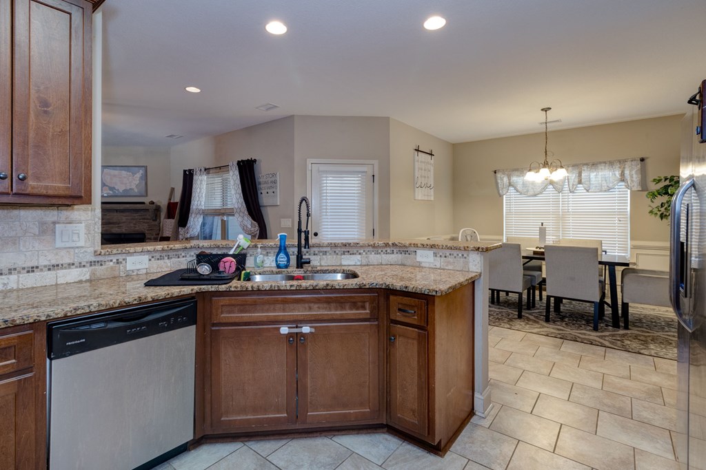 53 Winter Hawk Drive Fort Mitchell, AL 36856 - Photo 8 of 39 a kitchen with a sink and cabinets