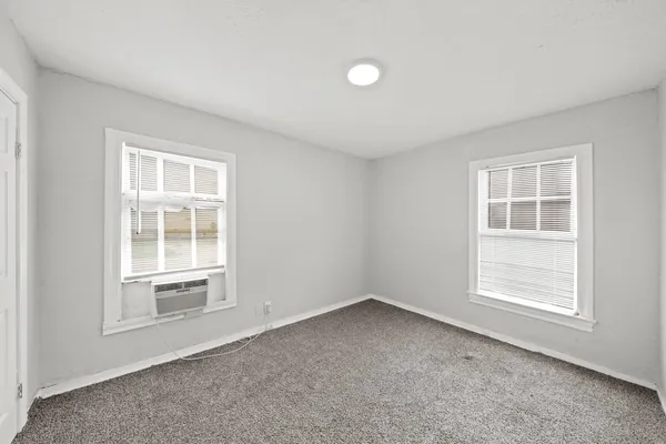 a bathroom with a sink and a window
