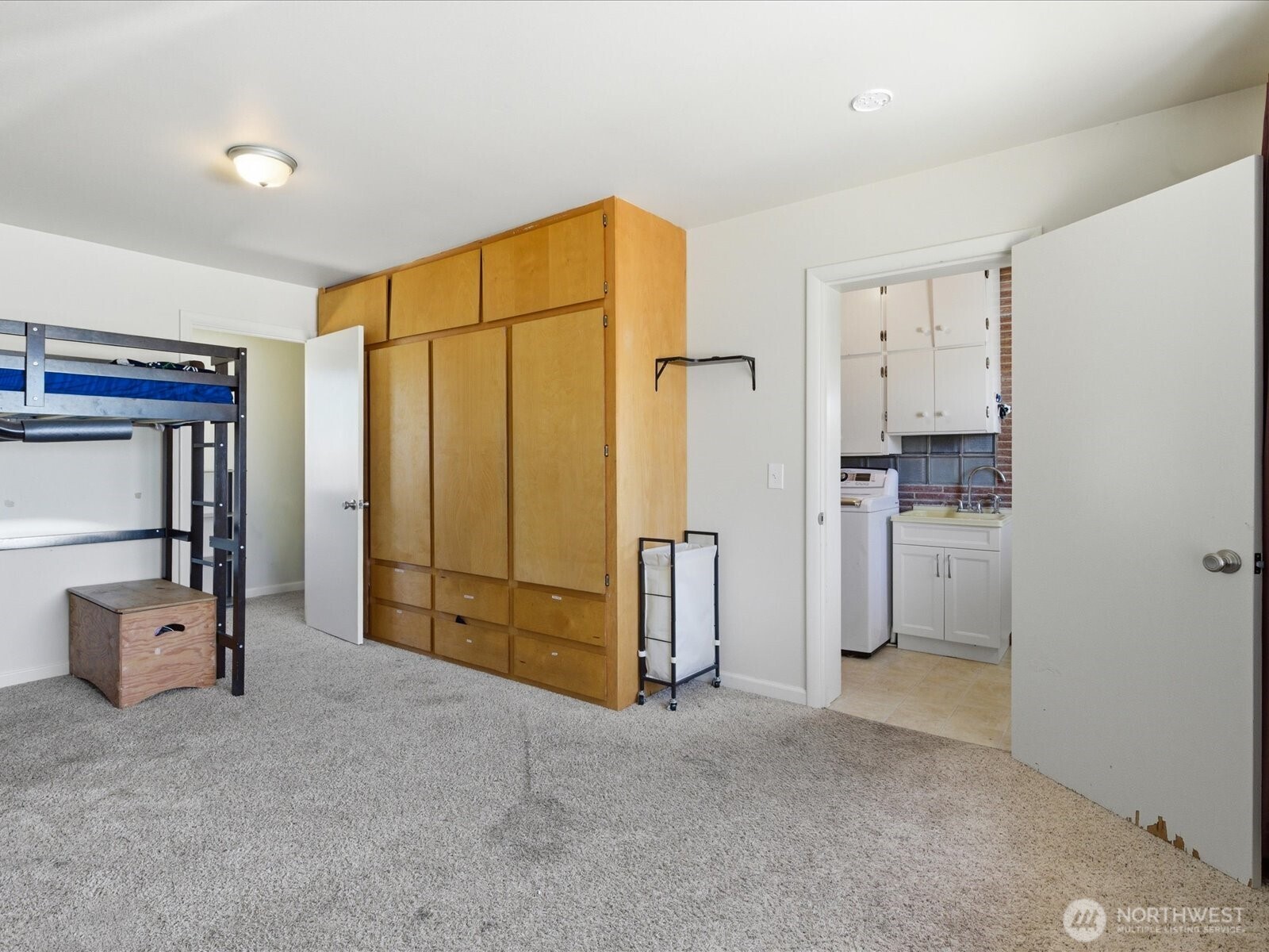 1417 Maple Street Sumner, WA 98390 - Photo 35 of 40 a view of a storage & utility room with washer and dryer