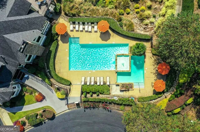 an outdoor space with furniture and garden view