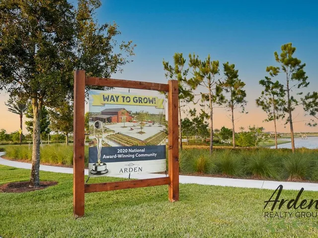 a view of a park with welcome board