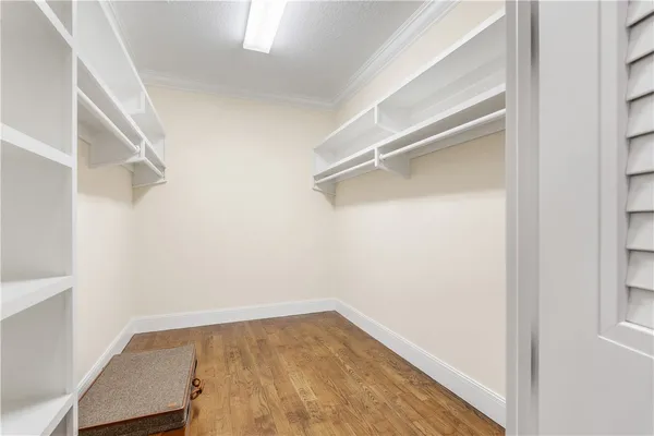 a view of an empty walk in closet