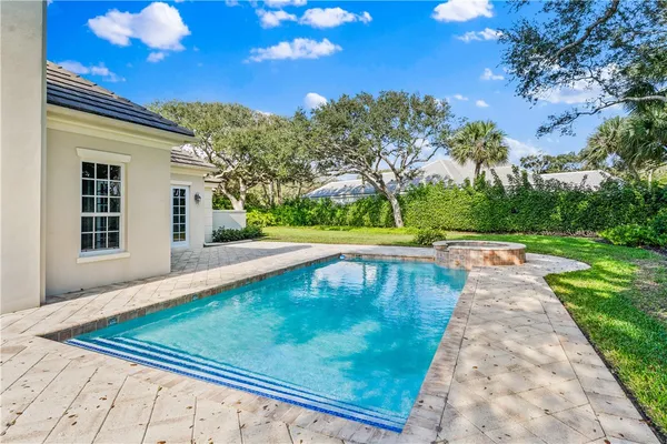 a view of a backyard with a garden