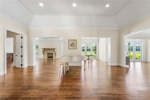 a view of dining room with furniture and wooden floor