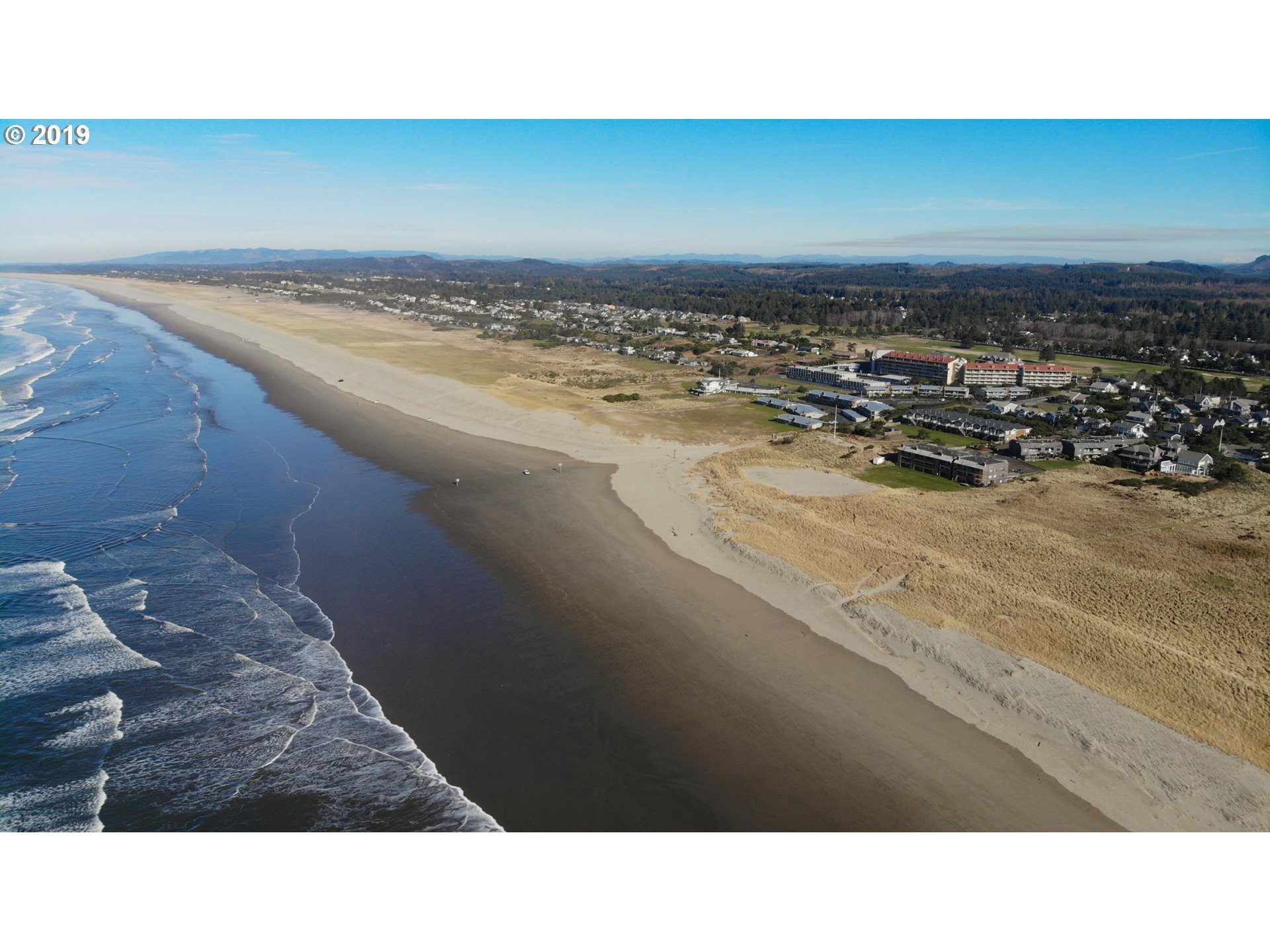 Windward Condo Gearhart, OR 97138 - Photo 2 of 24 a black and white photo of a room