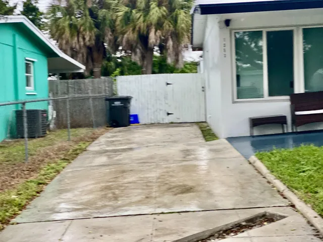 a view of a backyard of the house