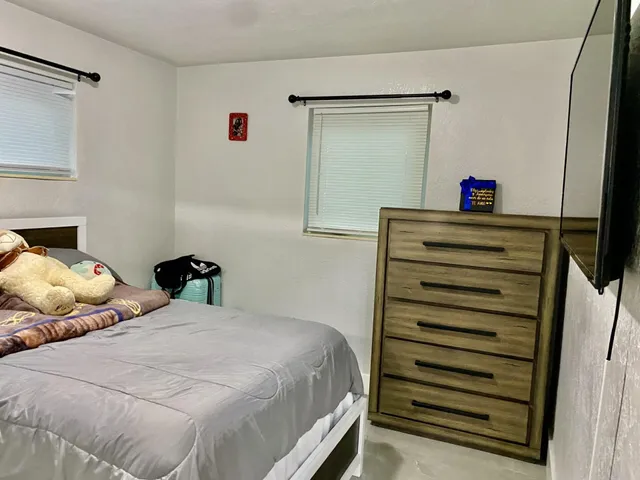 a workspace with furniture and a window