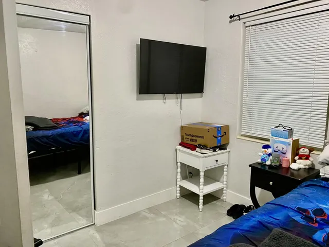 a view of a workspace with furniture