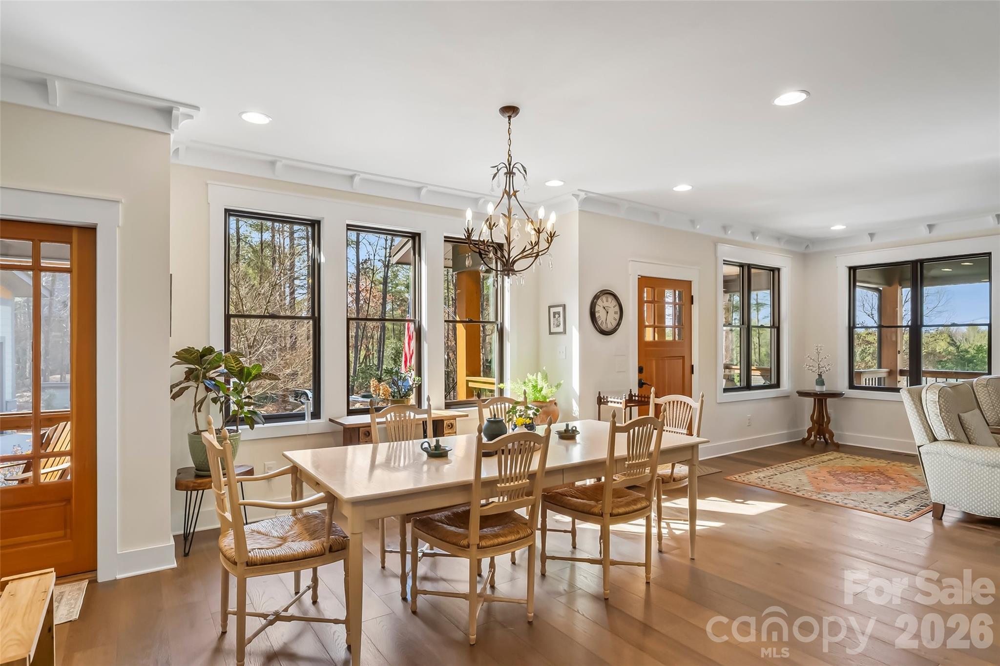 1267 Ten Whigs Ridge Nebo, NC 28761 - Photo 11 of 48 a view of a dining room with furniture window and wooden floor