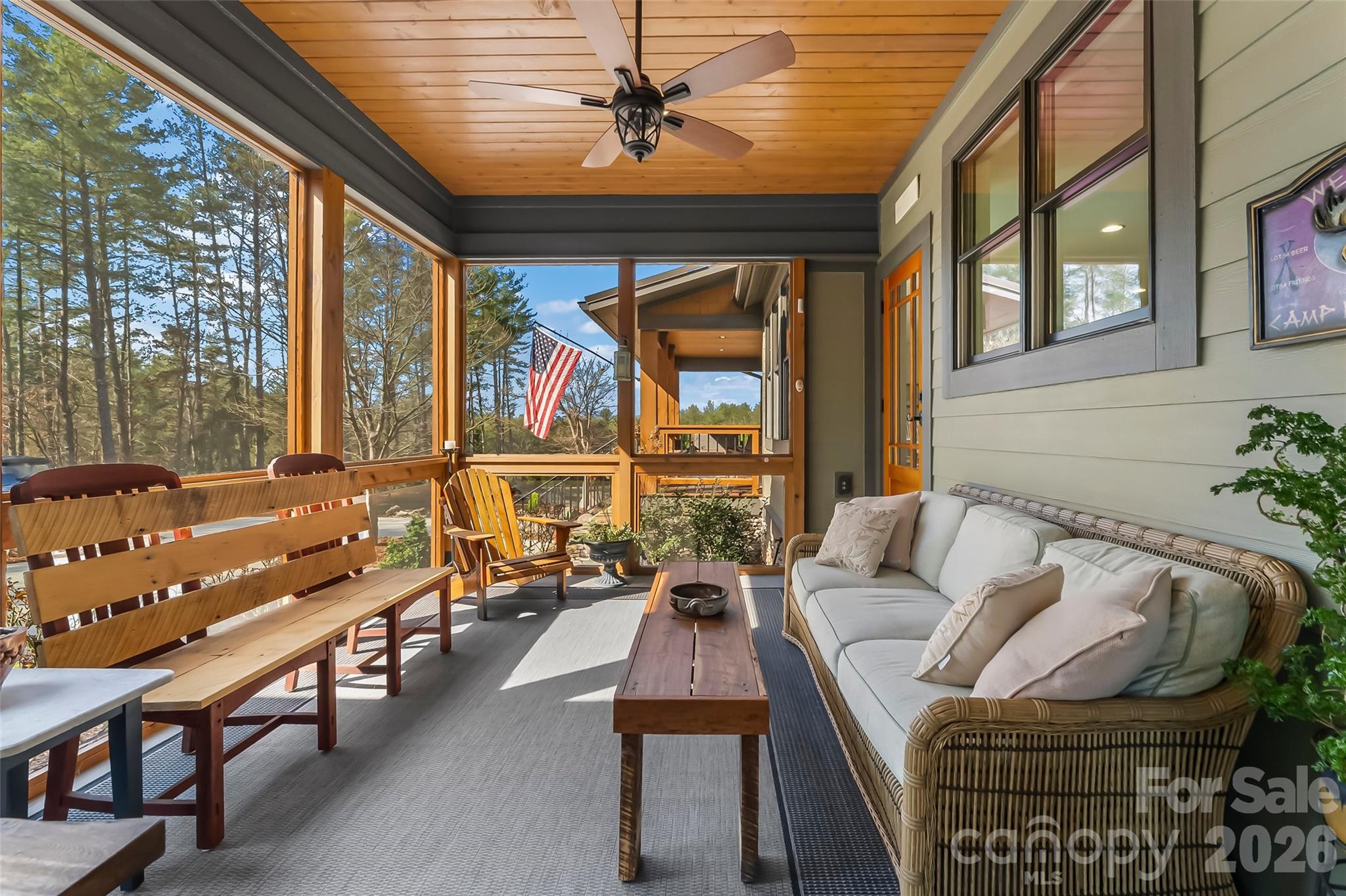 1267 Ten Whigs Ridge Nebo, NC 28761 - Photo 18 of 48 a living room with furniture ceiling fan and a window