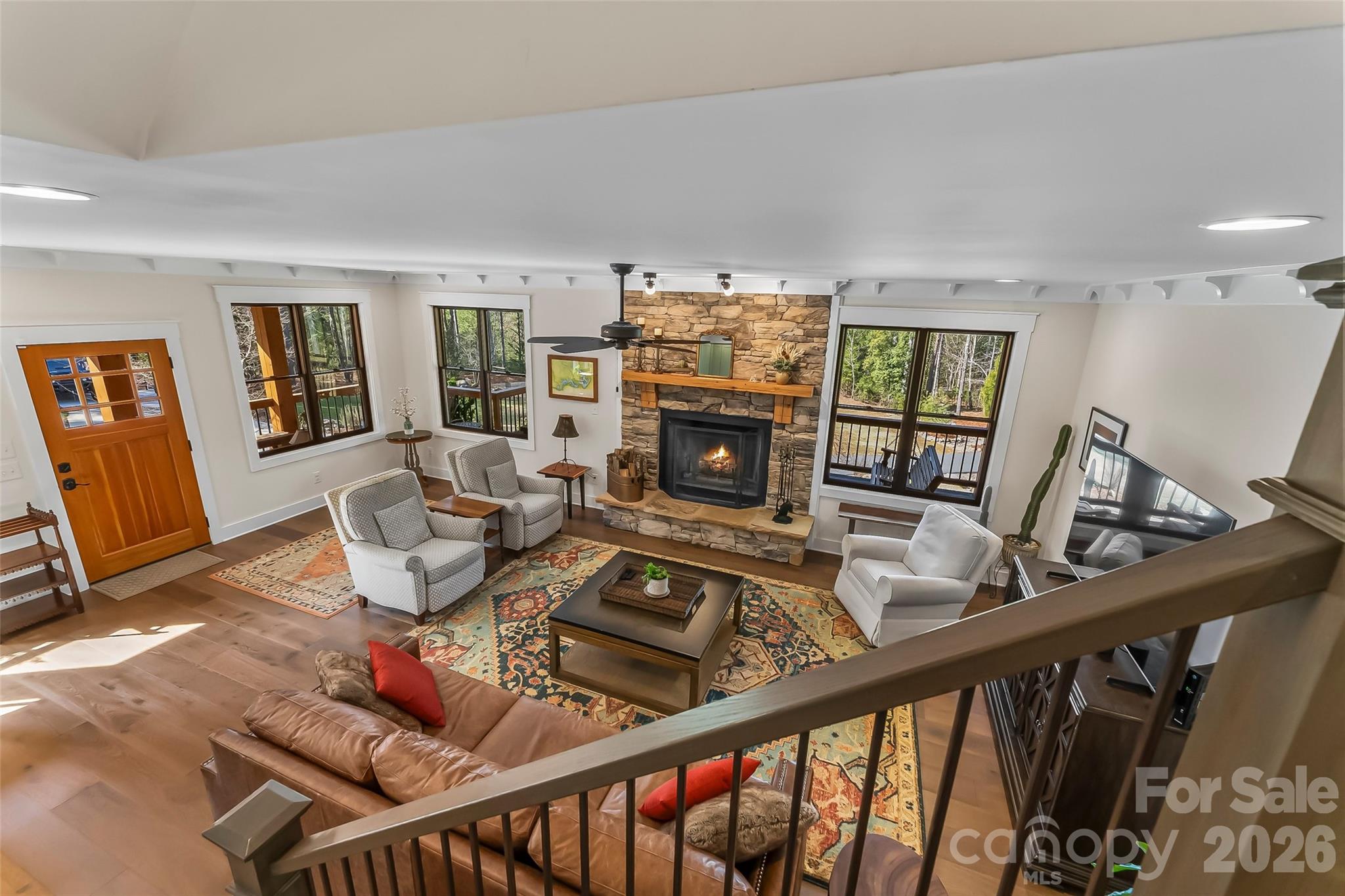 1267 Ten Whigs Ridge Nebo, NC 28761 - Photo 29 of 48 a view of a dining room with furniture window and wooden floor