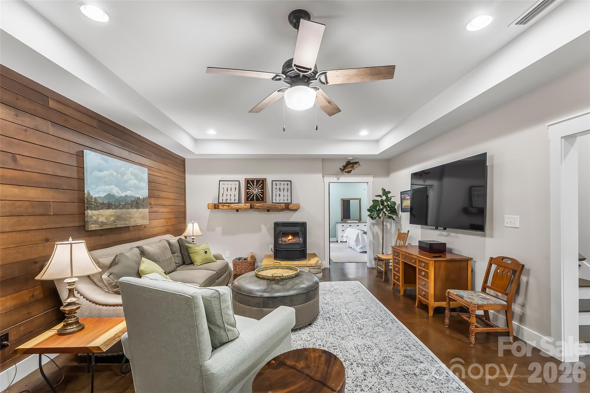 1267 Ten Whigs Ridge Nebo, NC 28761 - Photo 34 of 48 a living room with furniture and a flat screen tv