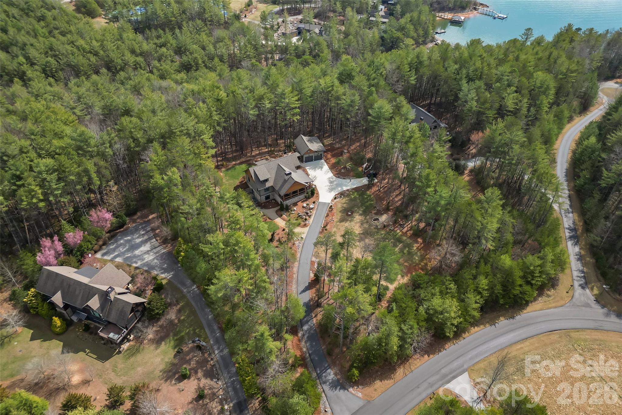 1267 Ten Whigs Ridge Nebo, NC 28761 - Photo 42 of 48 an aerial view of a house with a yard basket ball court and outdoor seating