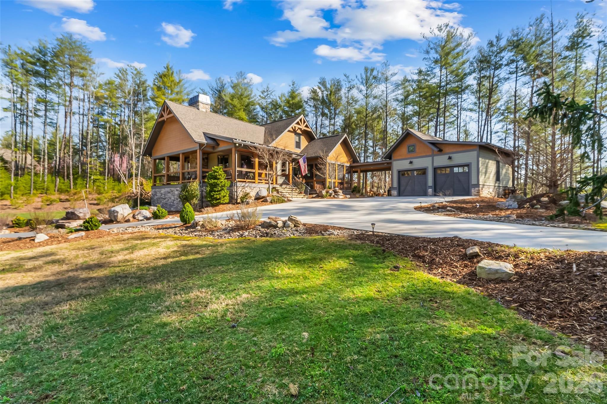 1267 Ten Whigs Ridge Nebo, NC 28761 - Photo 5 of 48 a front view of a house with a yard