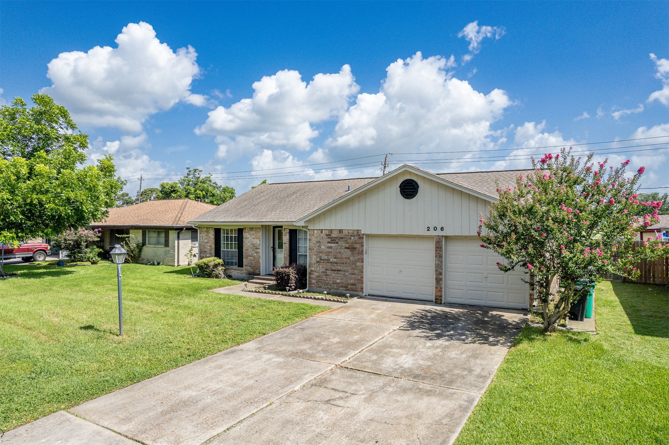 206 Kelly Lane Baytown, TX 77521 - Photo 6 of 38 The double wide driveway provides ample parking to keep your cars off the street.