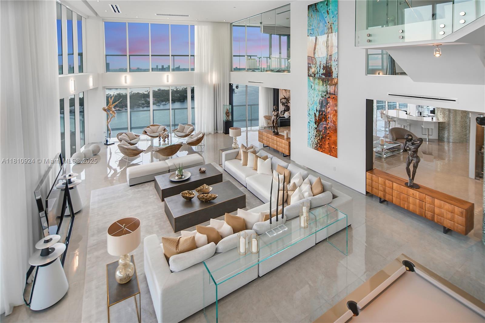 450 Alton Road, Unit PH1 Miami Beach, FL 33139 - Photo 15 of 47 a living room with furniture and a floor to ceiling window