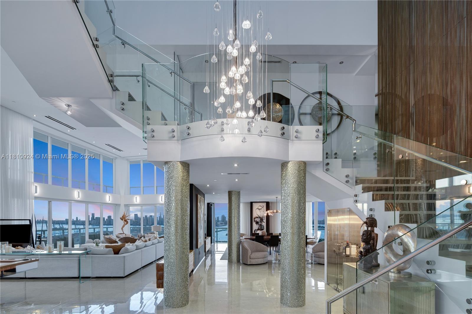 450 Alton Road, Unit PH1 Miami Beach, FL 33139 - Photo 16 of 47 a view of a living room and chandelier