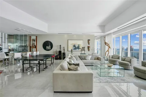 a view of a kitchen and dining room