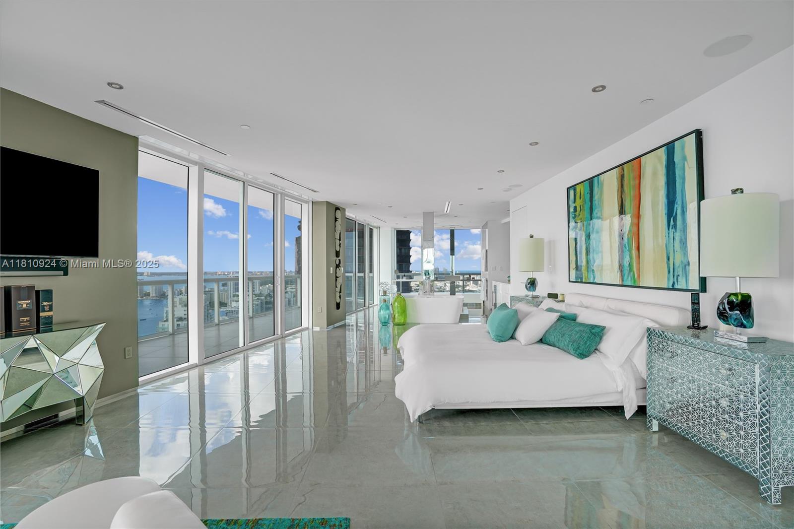 450 Alton Road, Unit PH1 Miami Beach, FL 33139 - Photo 19 of 47 a bedroom with a bed and glass window