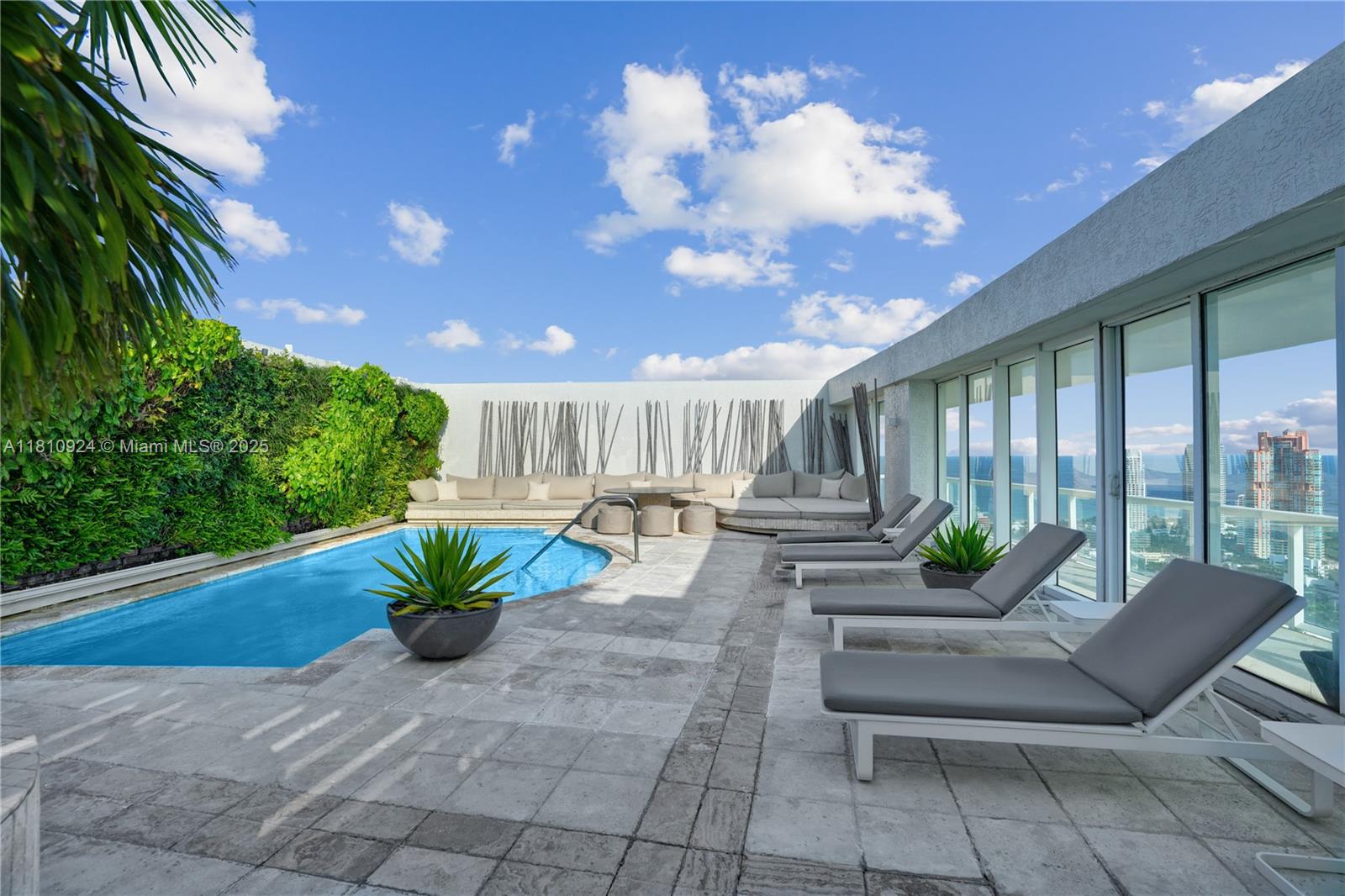 450 Alton Road, Unit PH1 Miami Beach, FL 33139 - Photo 5 of 47 a lobby with furniture and potted plants