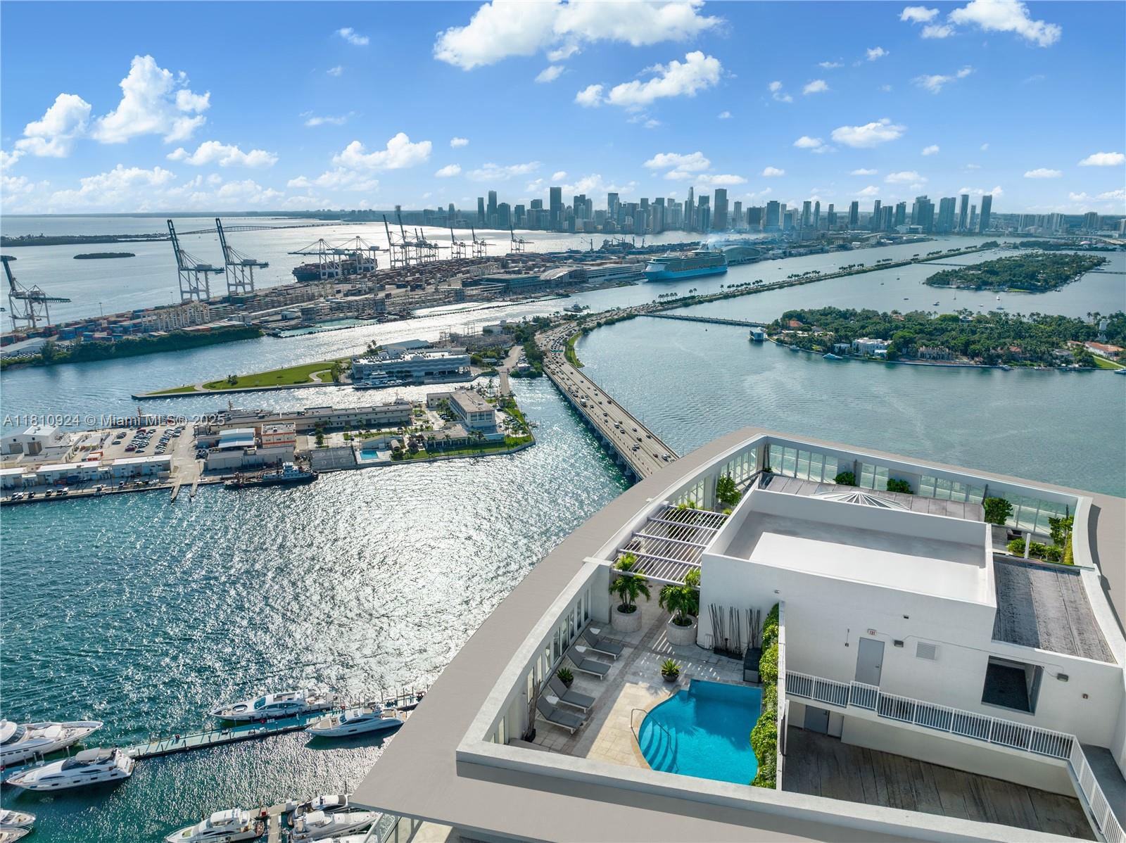 450 Alton Road, Unit PH1 Miami Beach, FL 33139 - Photo 8 of 47 a view of a lake with a terrace