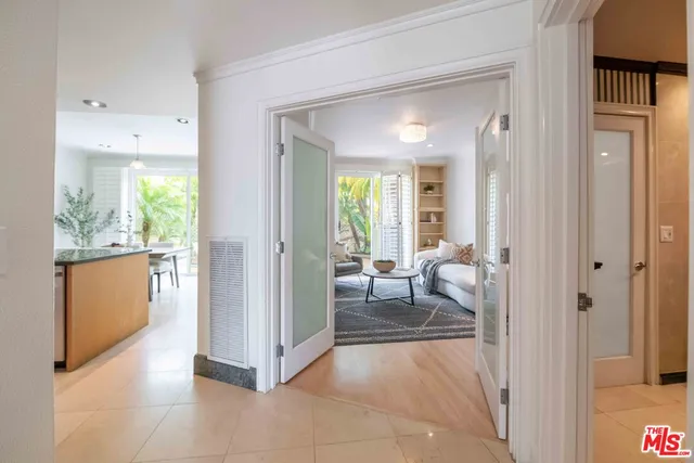 a view of a living room with a large window