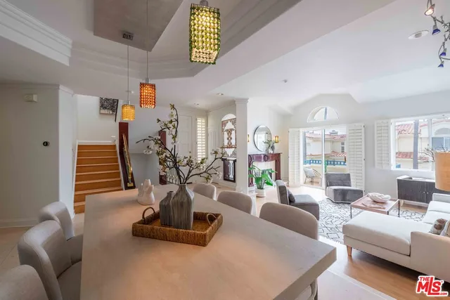 a view of a livingroom with furniture and windows