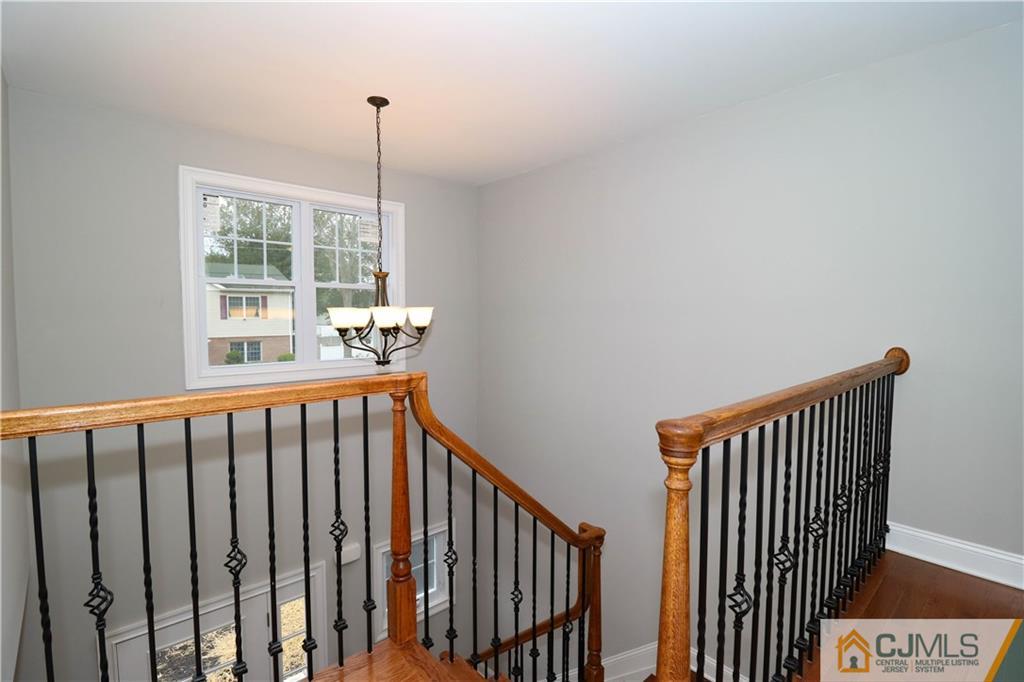 32 Windsor Road Edison, NJ 08817 - Photo 18 of 24 a view of a hallway with windows