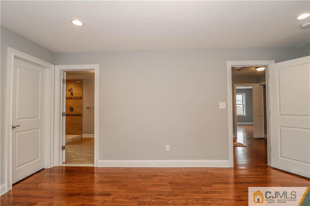 32 Windsor Road Edison, NJ 08817 - Photo 20 of 24 wooden floor in an empty room
