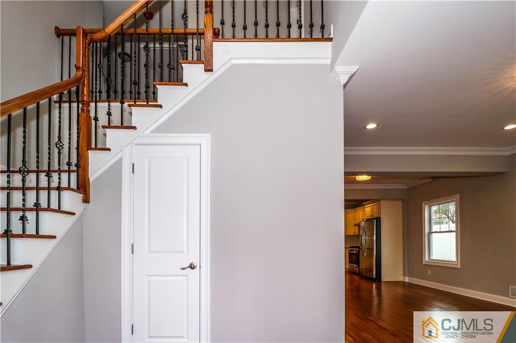 32 Windsor Road Edison, NJ 08817 - Photo 4 of 24 a view of staircase with railing and white walls